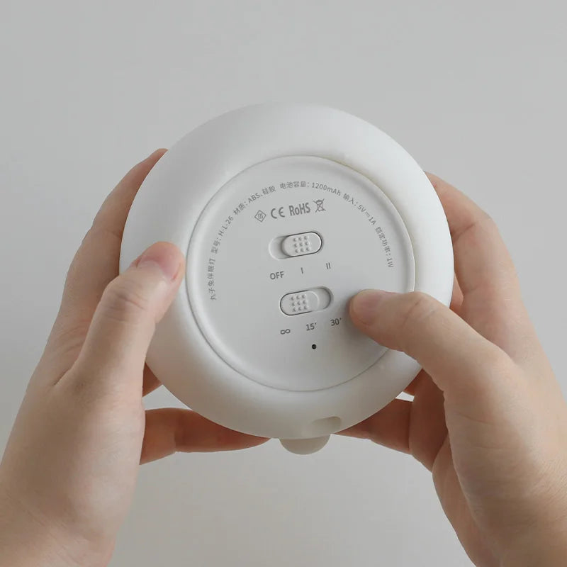 Veilleuse Lapinou avec plusieurs modes de lumière, idéale pour créer une ambiance douce et rassurante